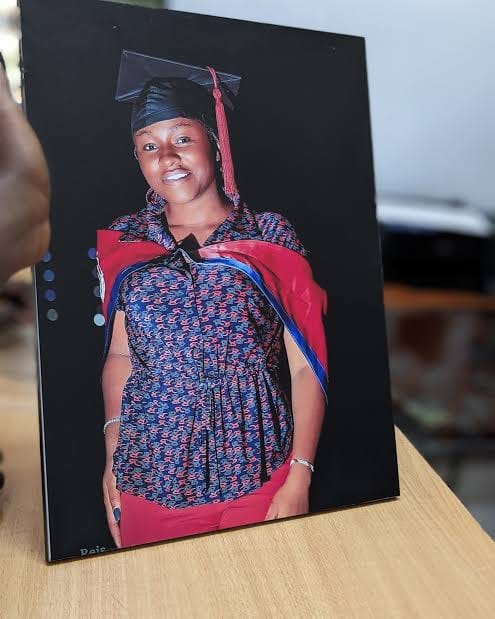 Graduation portrait displayed in a photo mount